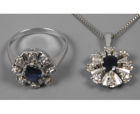 Schmuckset mit Saphiren und Diamantenum 1980, Weißgold gestempelt 585, Ring besetzt mit einem facettierten Saphir, umgeben vo