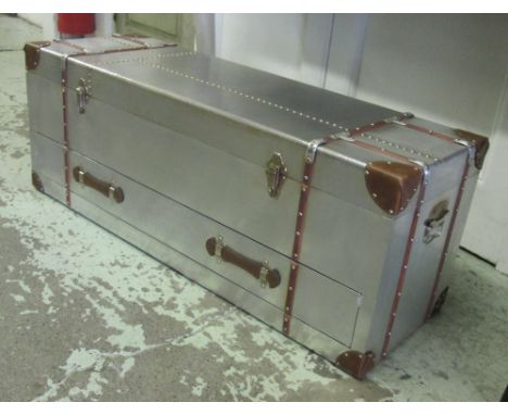 AVIATOR STYLE TRUNK, tan leather bound with a rectangular rising top enclosing space for storage over a single long drawer, 1