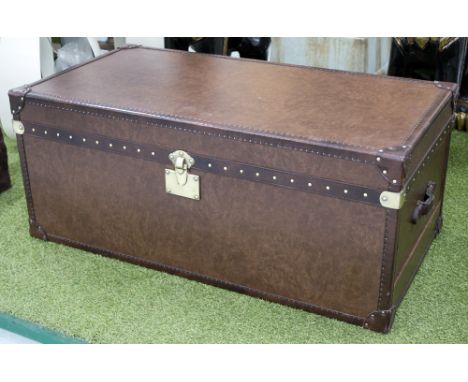 LOW TABLE, in the form of a vintage style leather bound trunk with a drawer to either end, 118cm x 61cm x 51cm H.