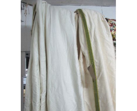 CURTAINS, two pairs, lined and interlined with green braid trim, each curtain 90cm W gathered x 260cm drop. (4)