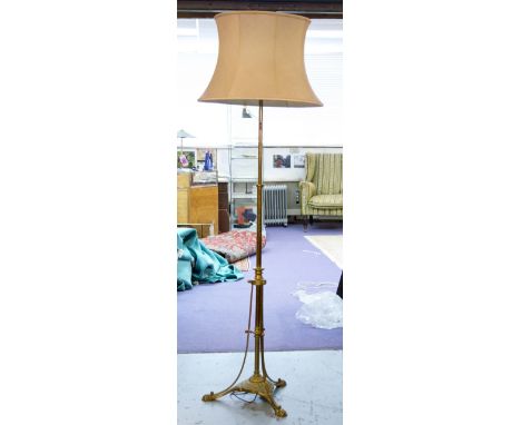 STANDARD LAMP, Edwardian brass of height adjustable telescopic form with cream shade, 195cm H shown.