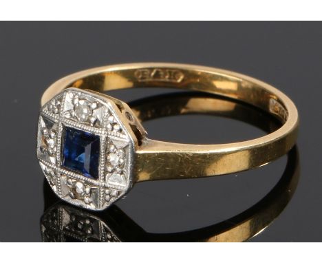 18 carat gold sapphire and diamond set ring, with a central sapphire and diamond surround, ring size L