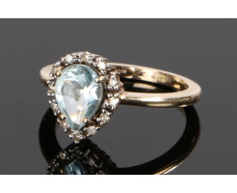 9 carat gold aquamarine set ring, with a pear cut aquamarine to the head, ring size K