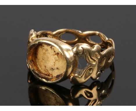 19th Century gold ring, with a vacant head and pierced shank, 2.8 grams, ring size H