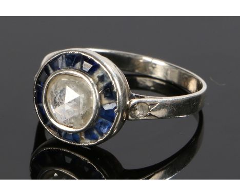 Diamond and sapphire set ring, with a central rose cut diamond and sapphire surround, ring size M 1/2