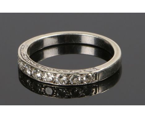 9 carat white gold diamond set half eternity ring, with a row of nine round cut diamonds, ring size O