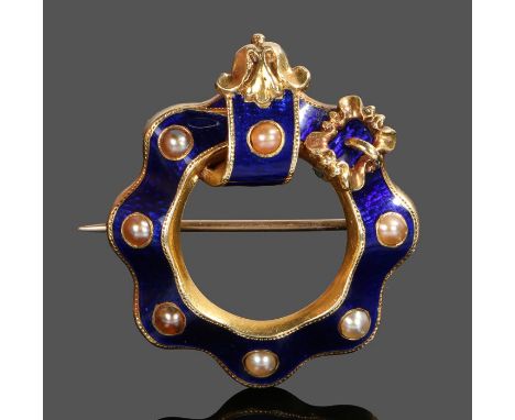 Victorian pearl and enamel brooch, with a wavy frame and buckle end, 32mm diameter 