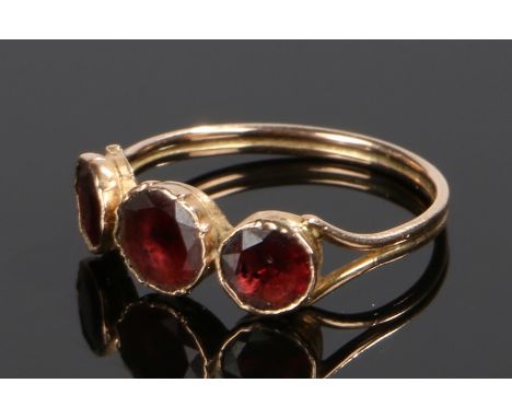 19th Century garnet set ring, with three garnets to the head, ring size Q