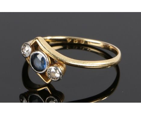 18 carat gold sapphire and diamond set ring, with a crossover head, ring size R 1/2