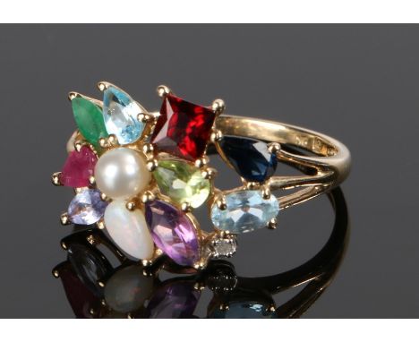 9 carat gold multi-stone ring, with a pearl, aquamarine, garnet, sapphire, emerald, amethyst and opal, ring size Q 