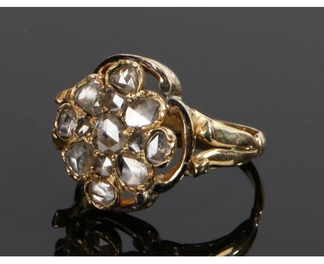 Diamond set cluster ring, the rose cut diamonds to the head at a total estimated at 1 carat, ring size P