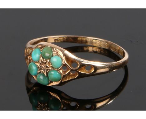 Victorian 15 carat gold turquoise set ring, with six turquoise stones to the flower head design, ring size O