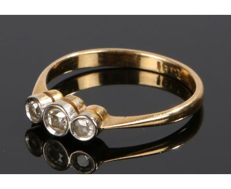 18 carat gold diamond set ring, with three round cut diamonds to the head, ring size O