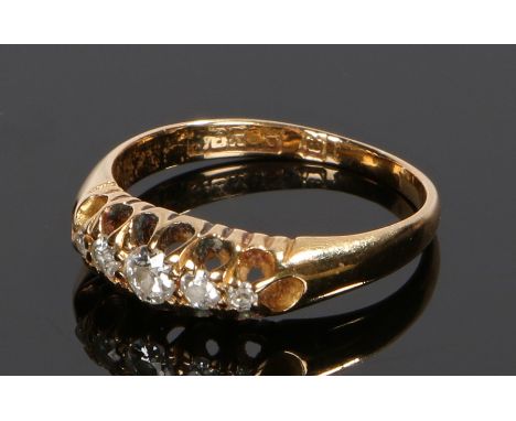 18 carat gold diamond set ring, with five round cut diamonds to the head, ring size J