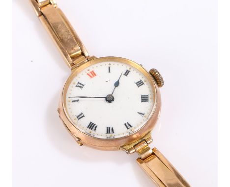 9 carat gold gentleman's wristwatch, the white dial with black and red Roman numerals, manual wound, the case 27.5mm wide, on