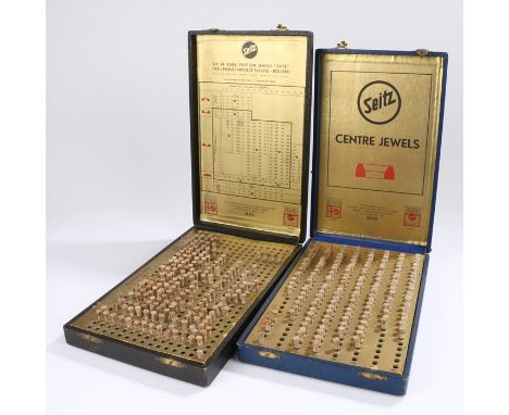 Two Seitz cased of watchmaker's jewels, to include centre, convex, flat, cap and roller jewels (2)Some of the tubes are empty