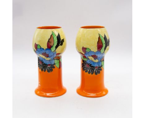 A pair of Wilkinson Ltd pottery "Indian Summer" patterned vases, shape no. 268, having bulbous necks and bright painted flora
