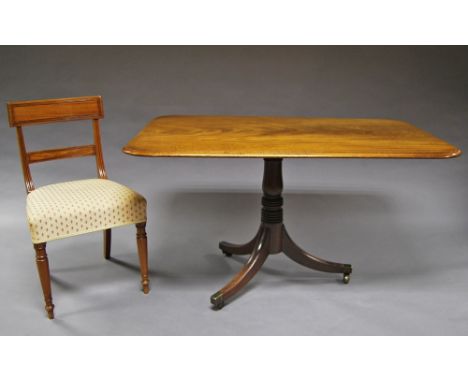 A Victorian mahogany tilt top table, raised on tripod legs; together with four Victorian mahogany upholstered dining chairs, 