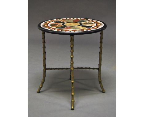 A circular specimen marble top table, gilt metal bamboo style legs, 56cm high x 50.5 diameter.  CONDITION REPORT: Some minor 