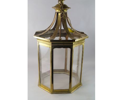 A large octagonal glazed hall lantern, 20th century, 103.5cm high CONDITION REPORT: In good condition, in need of clean, and 