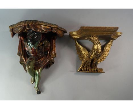 A gilt wood and gesso wall bracket, in the Venetian taste, 20th century, modelled as a plateau with a Blackamoor support, 37c