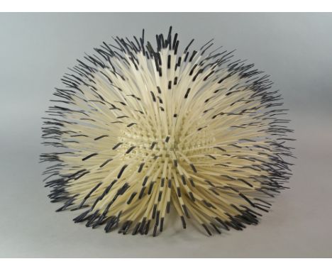 A Cable tie light, model 850, after a design by Claire Norcross for Habitat, 49cm diameter, together with a glass conical lam
