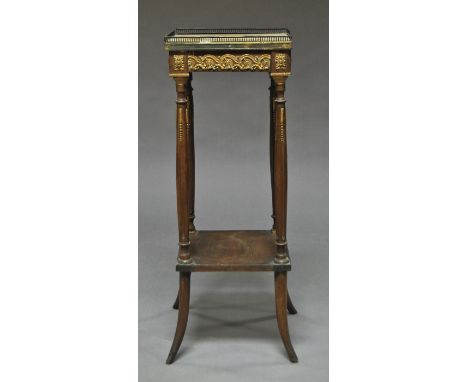 A French marble top side table, 19th century, decorated with gilt metal mounts, raised on outswept legs, 81cm high x 30 cm wi