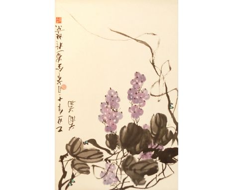 A Chinese scroll picture, decorated with grapes, signed in script and two red seals, 67 cm high, 43 cm wide.