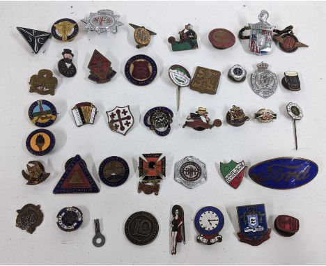 A selection of vintage badges to include Women Suffrage Societies, Ford, Guinness and othersLocation: 