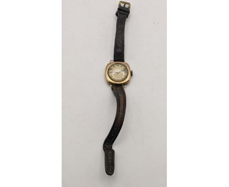 A 9ct gold ladies manual wind wristwatch, on a brown leather strap, total weight 15.5g, Location:CAB 3 
