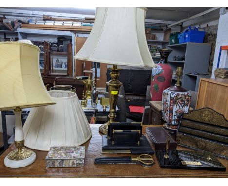 Table lamps and desk top items to include a Mexican white metal and mother of pearl cigarette box, Harrods brass and leather 