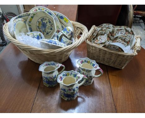 A basket of Masons Regency/Colonial table ceramics to include three jugs, octagonal bowl, meat plates, cups and saucers, and 