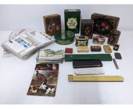 A mixed lot to include a collection of 1st day cover stamps c 1970s/80s postcards including animals, humorous and topographic