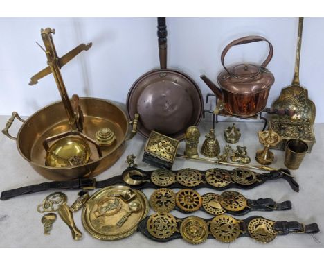 A selection of Victorian and later brass and copperware to include a skimmer, trivet stand, warming pan, weighting scales and
