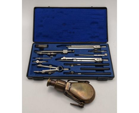 A brass nautical monocular spyglass  together with a cased set of scientific implementsLocation: 