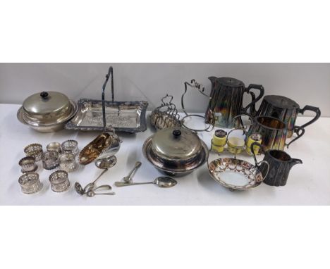 A mixed lot to include a silver plate Victorian four piece tea service, napkin rings, cutlery, an album of first day covers a