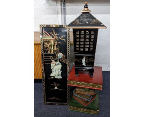 A vintage Japanned black lacquered wall hanging together with a matching lantern in the form of a pagoda and an occasional ta