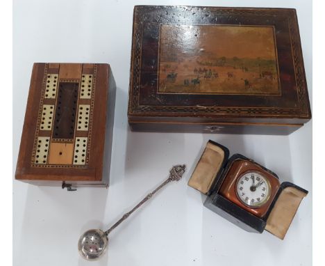 An early 20th century cribbage box, a white metal tea infuser and a Tunbridgeware box of a Brighton pier scene and a cube for