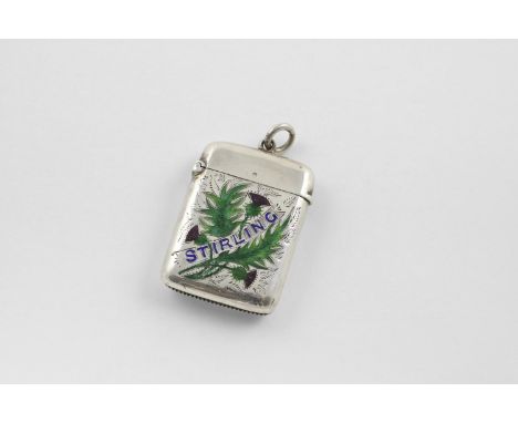 AN EDWARDIAN VESTA CASE. decorated with enamel on the front with a Scottish Thistle and "STERLING" through the centre, with s