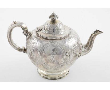 A VICTORIAN TEAPOT. of circular form, with bead borders, a C-scroll handle and a domed cover, profusely chased with foliate s