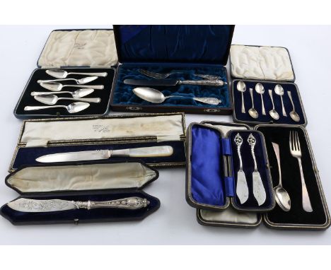 MISCELLANEOUS CASED SETS:-. a German three-piece travelling set, a cased set of 6 grapefruit spoons, a set of 6 tea/coffee sp