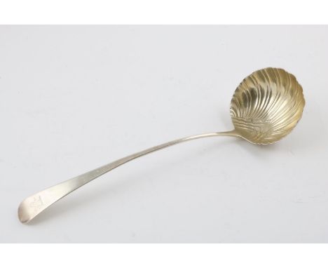 A GEORGE III SOUP LADLE. Old English Pattern, with a fluted circular bowl, crested, by William Sumner, London 1786; 13.1" (33