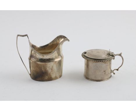 A GEORGE V SCOTTISH MUSTARD POT. with a gadrooned border, crested, gilt interior and clear glass liner, by James Mckay, Edinb