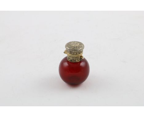 A SILVERGILT MOUNTED GLASS SCENT BOTTLE. with a button release cap and a hinged cover engraved with flowers and scrolls, init