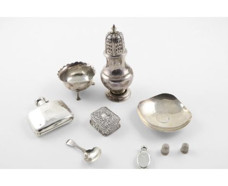 A MIXED LOT:-. a George V sugar caster, a Victorian sugar bowl, an Indian pin dish, inset with a coin and inscribed, a spirit