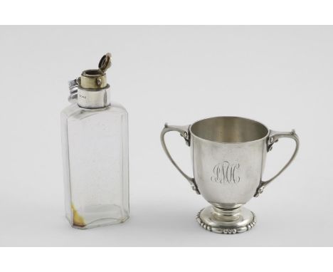 A GEORGE V TWO HANDLED CHRISTENING CUP. the scroll handles with rivet-like decoration, on a beaded circular foot, initialled,