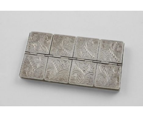 A MODERN PILL BOX. of rectangular form, divided into 8 segments, with engraved and  hinged covers, by Ari D Norman, London 19