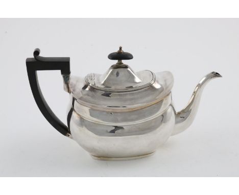 A GEORGE III TEAPOT. of rounded oblong form, with an angular handle and a wooden finial, by Samuel &amp; Edward Davenport, Lo