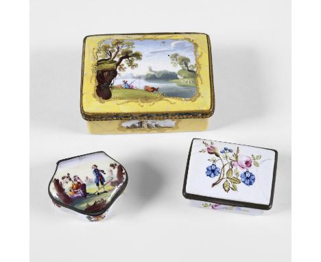 A STAFFORDSHIRE ENAMEL SNUFFBOX. yellow with reserved landscape panels, gilt metal mounts 8.5 cms and two patch boxes, one pa