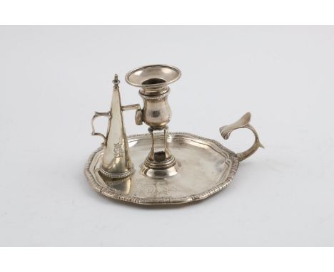 A GEORGE III CHAMBERSTICK. of shaped circular outline, with a gadrooned border, crested, maker's mark "I, Mullet, H", London 